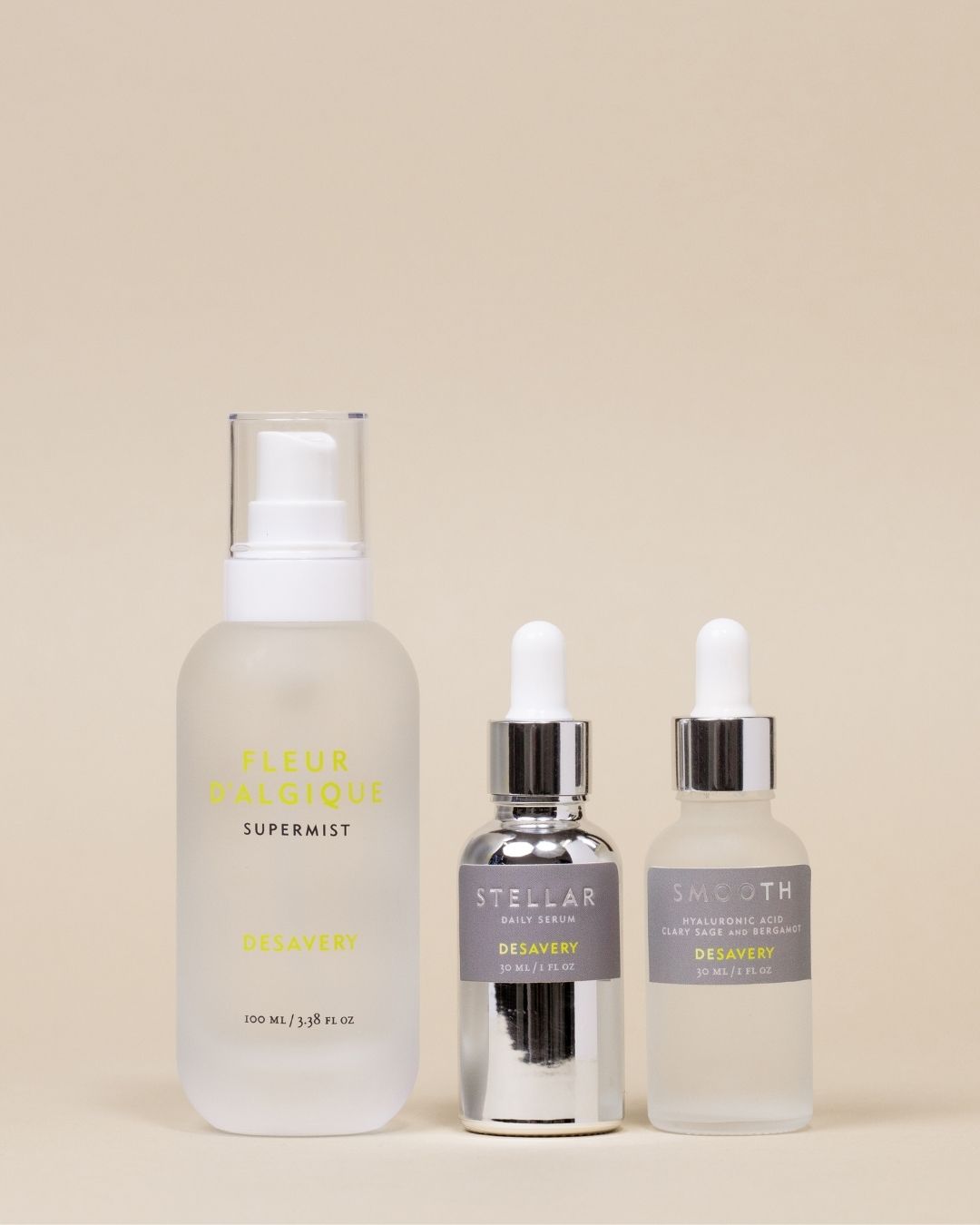 Three skincare products on a beige background