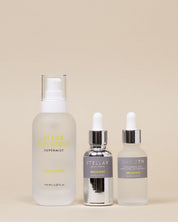 Three skincare products on a beige background